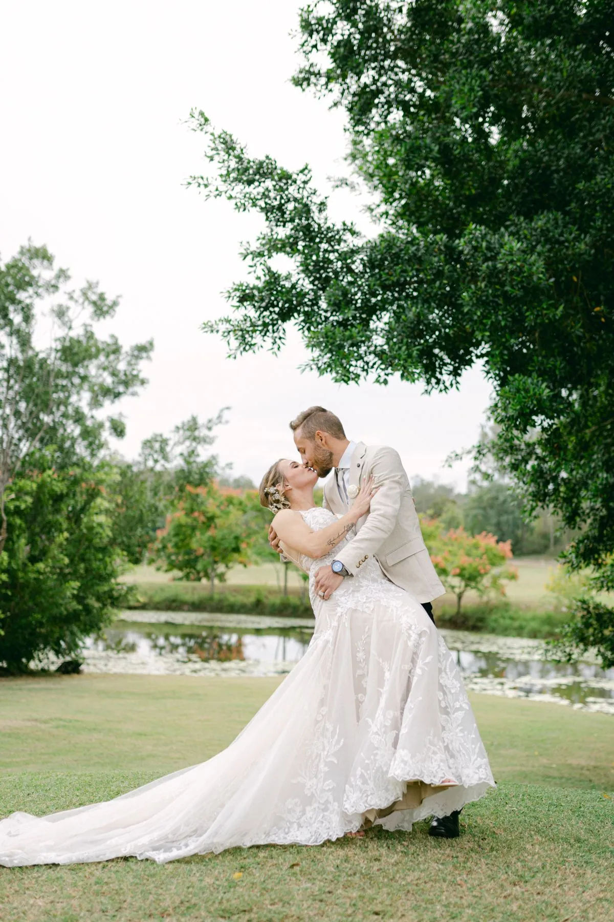 Couple portrait under the arbour at The Kooralbyn Valley
