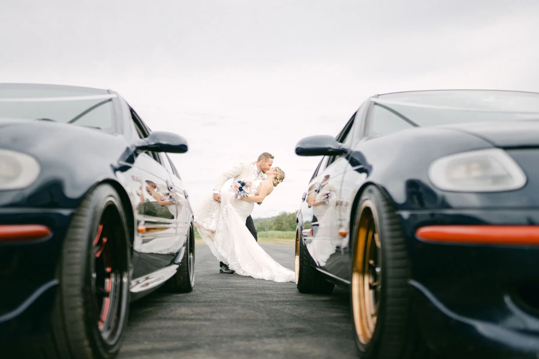 Wedding kiss with a floral hairpiece