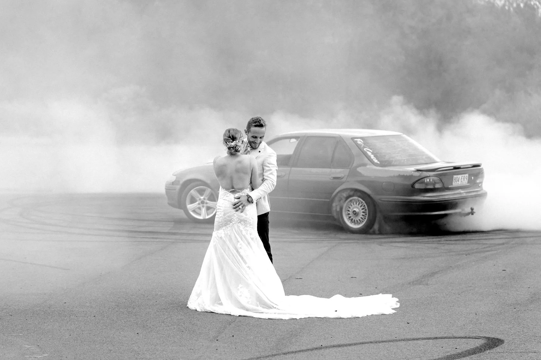 Bride and groom, black and white burnout portrait